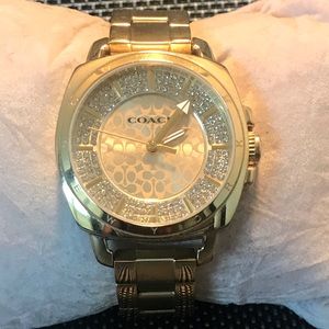 Gold coach watch